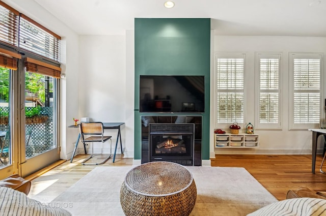 2145 W Crystal St Unit 2, Chicago, IL 60622 - living area featuring wood finished floors, recessed lighting, and a tile fireplace