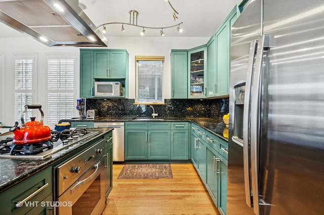 2145 W Crystal St Unit 2, Chicago, IL 60622 - kitchen with stainless steel appliances, range hood, and green cabinets
