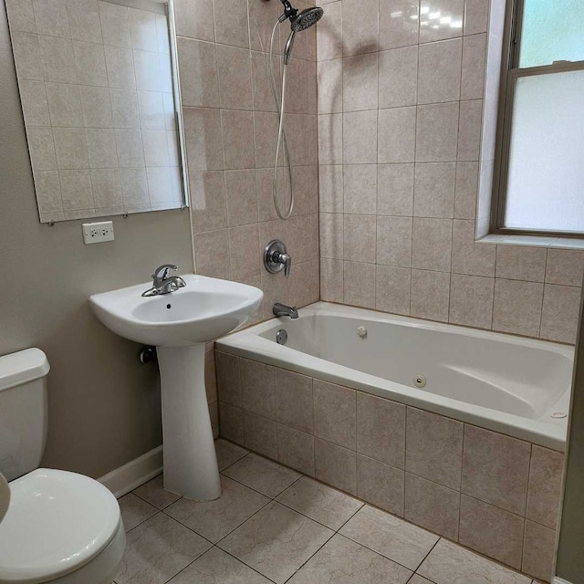 3700 W Cermak Rd Unit 1, Chicago, IL 60623 - bathroom with tile patterned flooring and tiled shower / bath combo