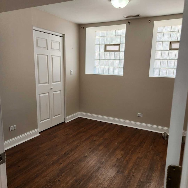 3700 W Cermak Rd Unit 1, Chicago, IL 60623 - unfurnished room with plenty of natural light and dark wood-style floors