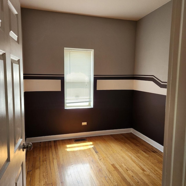 3700 W Cermak Rd Unit 1, Chicago, IL 60623 - unfurnished room with hardwood / wood-style floors and baseboards