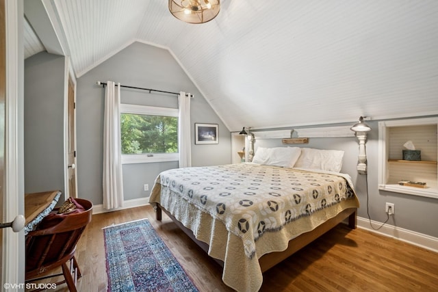 241 Hoy Ave, Woodstock, IL 60098 - bedroom with lofted ceiling and wood finished floors