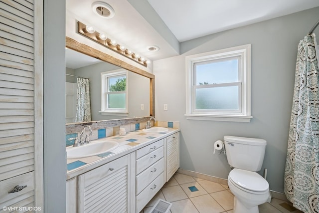241 Hoy Ave, Woodstock, IL 60098 - bathroom with double vanity and tile patterned flooring