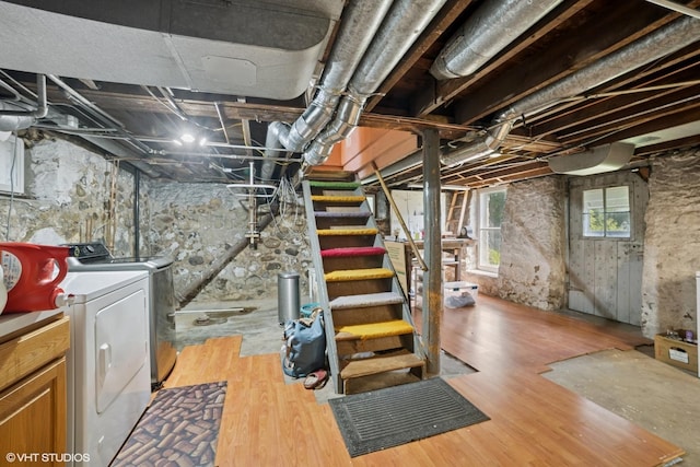 241 Hoy Ave, Woodstock, IL 60098 - basement featuring washer and dryer, wood finished floors, and stairs