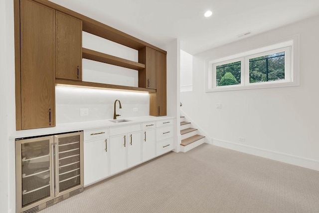 2248 W Ainslie St, Chicago, IL 60625 - indoor wet bar with beverage cooler, light carpet, recessed lighting, and stairs