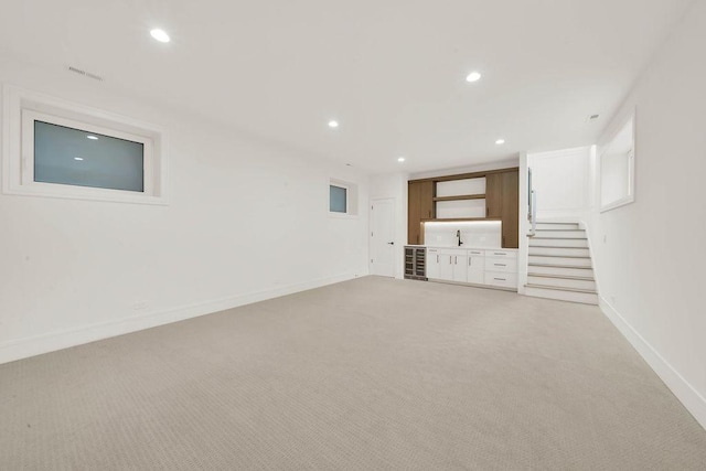 2248 W Ainslie St, Chicago, IL 60625 - basement featuring light colored carpet, recessed lighting, and beverage cooler