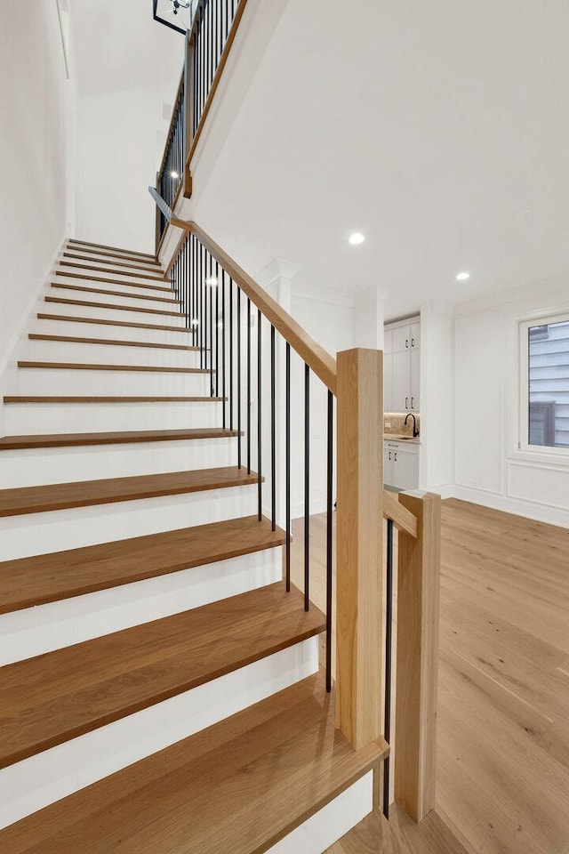 2248 W Ainslie St, Chicago, IL 60625 - stairway featuring wood finished floors and recessed lighting