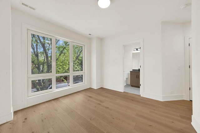 2248 W Ainslie St, Chicago, IL 60625 - unfurnished room featuring light wood-type flooring and baseboards
