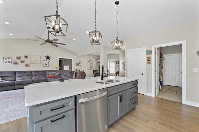 1807 E Fairfield Cir, Urbana, IL 61802 - kitchen with stainless steel dishwasher, a chandelier, gray cabinets, open floor plan, and a ceiling fan