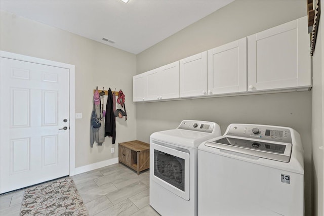 1807 E Fairfield Cir, Urbana, IL 61802 - washroom featuring cabinet space and washer and dryer