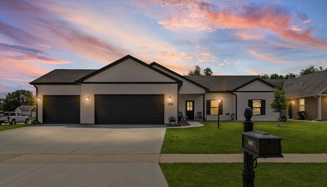 1807 E Fairfield Cir, Urbana, IL 61802 - view of front of house with an attached garage, concrete driveway, and a front yard