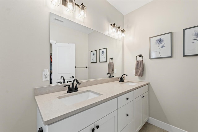 1807 E Fairfield Cir, Urbana, IL 61802 - full bathroom featuring double vanity and baseboards