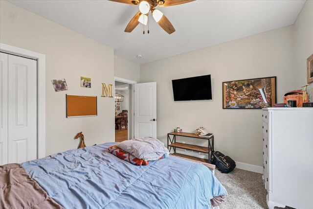 1807 E Fairfield Cir, Urbana, IL 61802 - bedroom with carpet floors, ceiling fan, and a closet