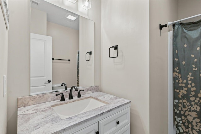 1807 E Fairfield Cir, Urbana, IL 61802 - bathroom featuring vanity and a shower with curtain