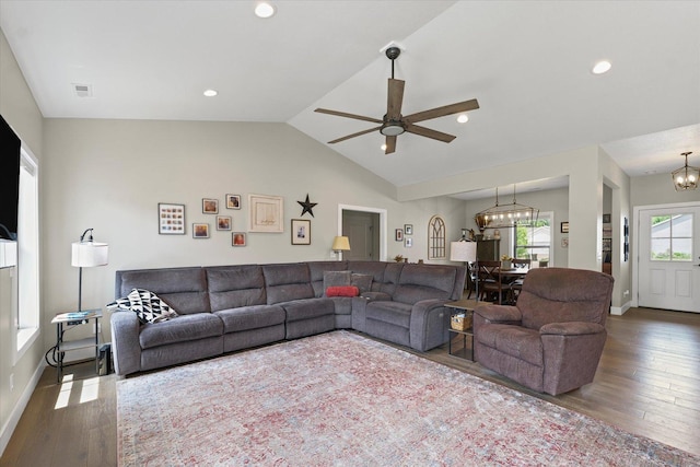 1807 E Fairfield Cir, Urbana, IL 61802 - living room featuring a chandelier, hardwood / wood-style floors, a ceiling fan, vaulted ceiling, and recessed lighting
