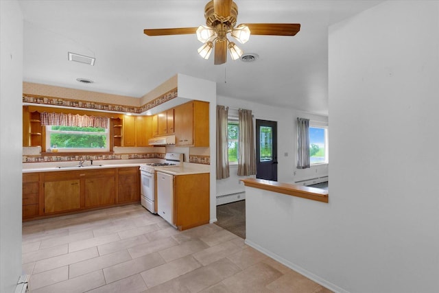 405 E Madison St, Pesotum, IL 61863 - kitchen featuring white gas range, open shelves, plenty of natural light, and a ceiling fan
