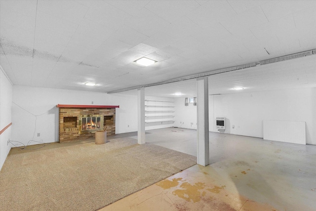 405 E Madison St, Pesotum, IL 61863 - garage with heating unit and a brick fireplace