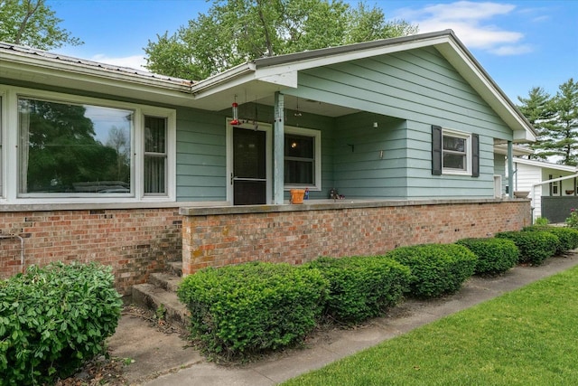 405 E Madison St, Pesotum, IL 61863 - view of front of home featuring brick siding