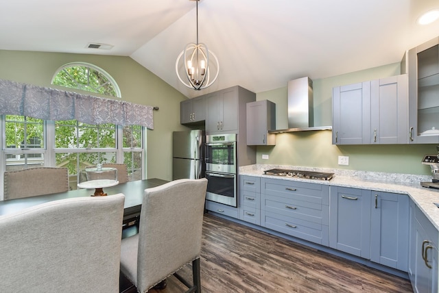 30W050 Willow Ln Unit 30W050, Warrenville, IL 60555 - kitchen featuring wall chimney range hood, stainless steel appliances, a chandelier, vaulted ceiling, and dark wood-style flooring