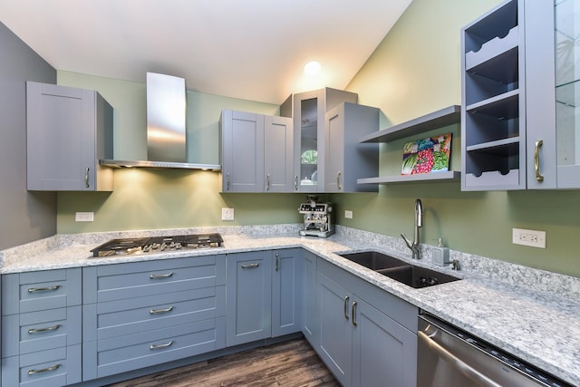 30W050 Willow Ln Unit 30W050, Warrenville, IL 60555 - kitchen with wall chimney range hood, appliances with stainless steel finishes, dark wood-style flooring, glass insert cabinets, and light stone counters