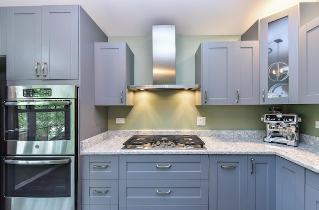 30W050 Willow Ln Unit 30W050, Warrenville, IL 60555 - kitchen featuring stainless steel appliances, wall chimney exhaust hood, and light stone countertops