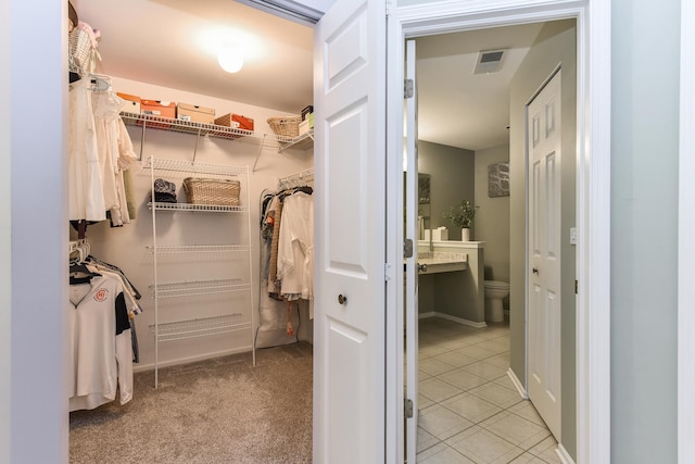 30W050 Willow Ln Unit 30W050, Warrenville, IL 60555 - walk in closet featuring light tile patterned flooring