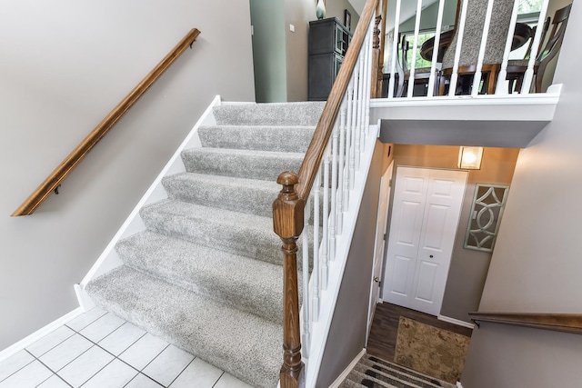 30W050 Willow Ln Unit 30W050, Warrenville, IL 60555 - stairway featuring baseboards and tile patterned floors