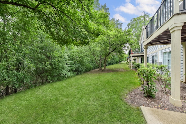 30W050 Willow Ln Unit 30W050, Warrenville, IL 60555 - view of green lawn featuring a balcony