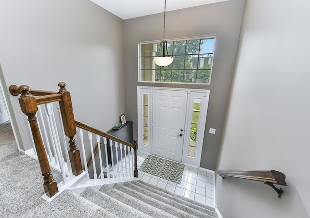 30W050 Willow Ln Unit 30W050, Warrenville, IL 60555 - foyer featuring tile patterned floors and a towering ceiling