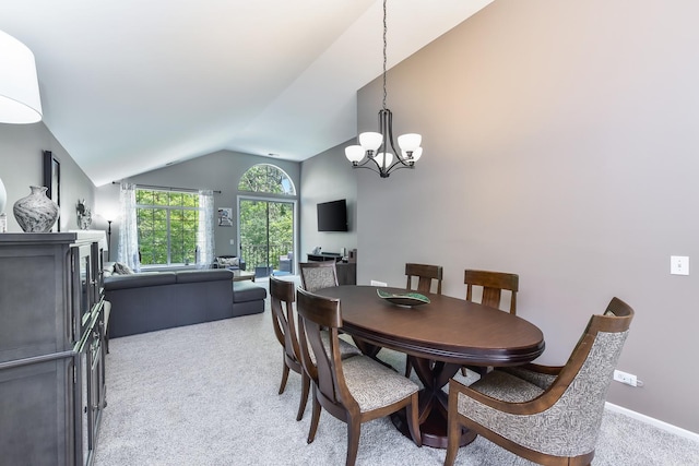 30W050 Willow Ln Unit 30W050, Warrenville, IL 60555 - dining area with vaulted ceiling, light carpet, and a chandelier