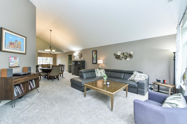 30W050 Willow Ln Unit 30W050, Warrenville, IL 60555 - living room featuring light colored carpet, a chandelier, and high vaulted ceiling