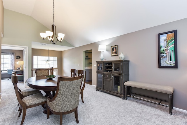 30W050 Willow Ln Unit 30W050, Warrenville, IL 60555 - dining space with a chandelier, lofted ceiling, and light colored carpet