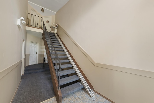 12912 Mill Dr E, Palos Park, IL 60464 - stairway featuring a high ceiling and baseboards