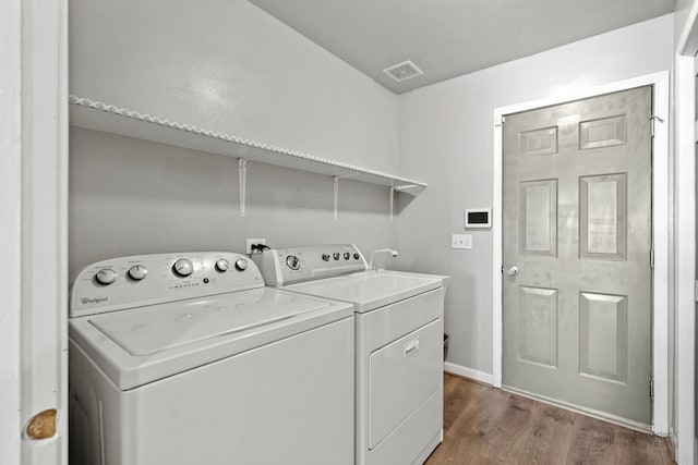 516 Madison Ln, Elgin, IL 60123 - laundry area with washer and dryer and dark wood finished floors