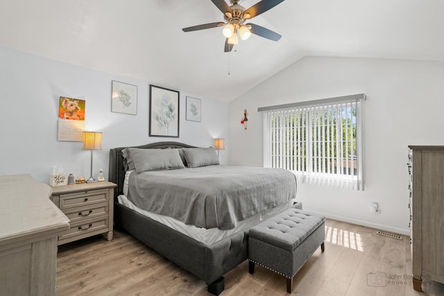 516 Madison Ln, Elgin, IL 60123 - bedroom with vaulted ceiling, light wood-type flooring, and a ceiling fan