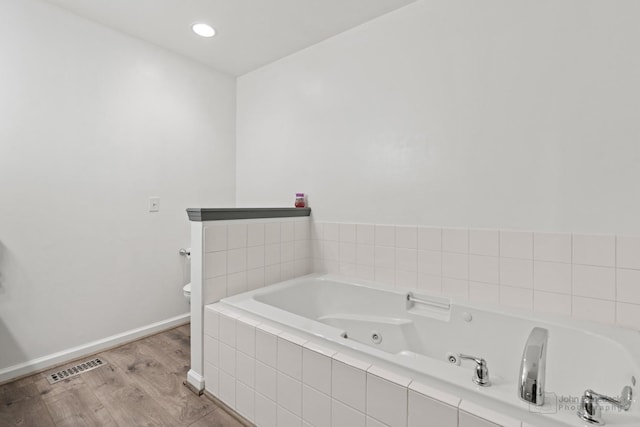 516 Madison Ln, Elgin, IL 60123 - full bathroom with wood finished floors, a whirlpool tub, and recessed lighting