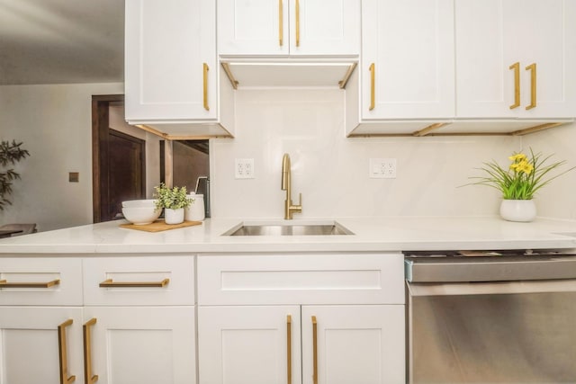 2112 N Seminary Ave Unit 19, Chicago, IL 60614 - kitchen featuring stainless steel dishwasher, light countertops, and white cabinetry