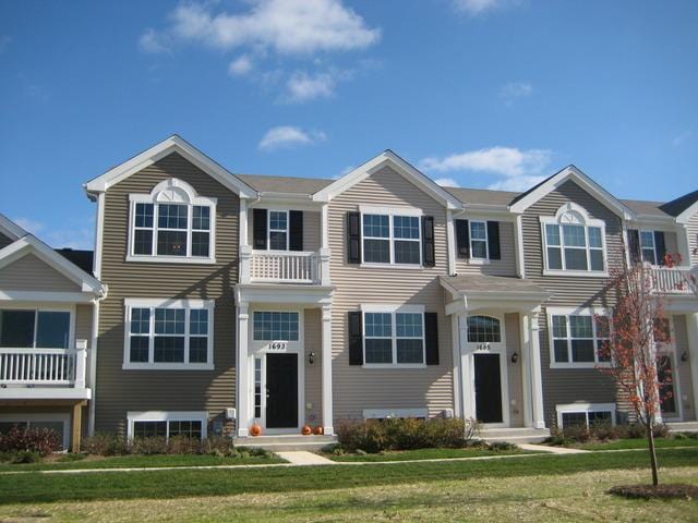 1746 Spinnaker St Unit 0, Pingree Grove, IL 60140 - multi unit property featuring a front lawn and a balcony