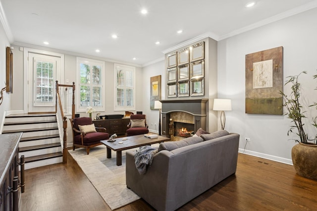 3547 N Fremont St Unit 1N, Chicago, IL 60657 - living room with dark wood-type flooring, a lit fireplace, ornamental molding, recessed lighting, and stairway