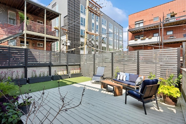 3547 N Fremont St Unit 1N, Chicago, IL 60657 - wooden terrace featuring an outdoor living space and a fenced backyard