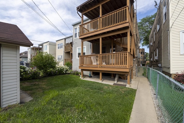 6712 N Maplewood Ave, Chicago, IL 60645 - back of house with a fenced backyard and a wooden deck