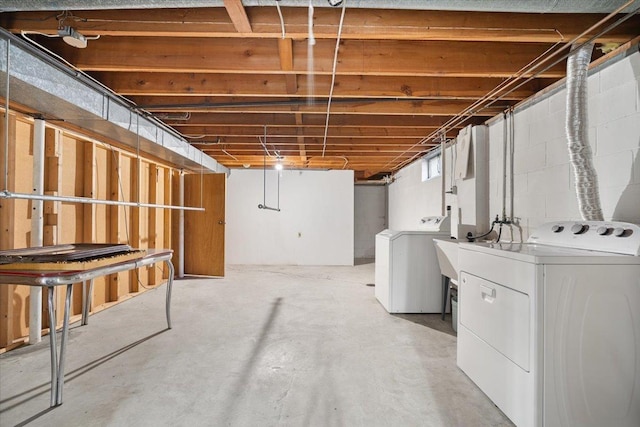 200 S Madison St, Towanda, IL 61776 - unfinished basement featuring washing machine and dryer