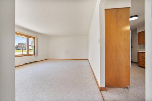 200 S Madison St, Towanda, IL 61776 - unfurnished room with baseboard heating and carpet flooring