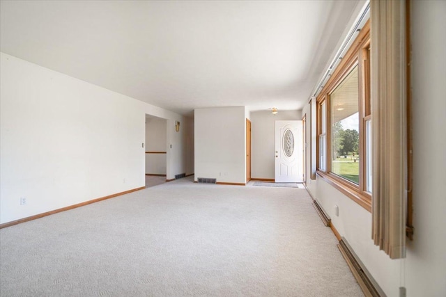 200 S Madison St, Towanda, IL 61776 - empty room with light carpet