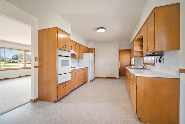 200 S Madison St, Towanda, IL 61776 - kitchen with white appliances, a warming drawer, light countertops, open shelves, and light colored carpet