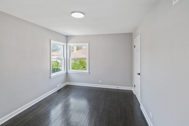 2263 S 14th Ave, North Riverside, IL 60546 - empty room with dark wood-type flooring and baseboards