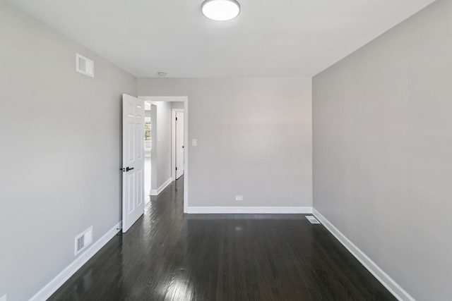 2263 S 14th Ave, North Riverside, IL 60546 - spare room featuring baseboards and dark wood finished floors