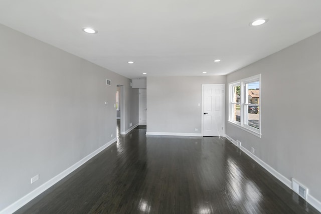 2263 S 14th Ave, North Riverside, IL 60546 - empty room featuring dark wood-type flooring and recessed lighting