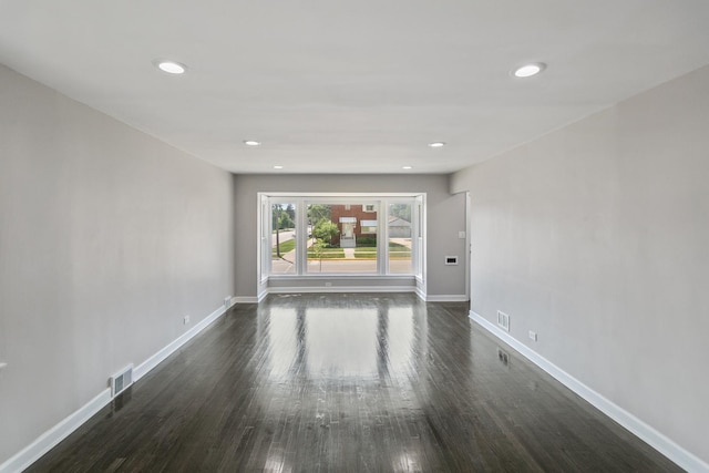 2263 S 14th Ave, North Riverside, IL 60546 - empty room featuring dark wood-style floors and recessed lighting