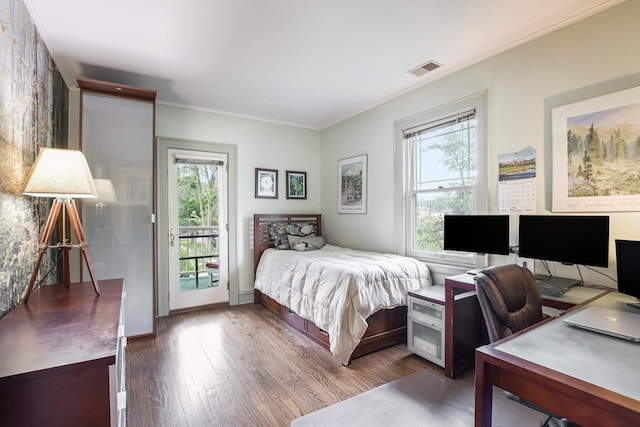 718 S Washington Ave, Park Ridge, IL 60068 - bedroom with multiple windows, wood finished floors, an office area, access to outside, and crown molding